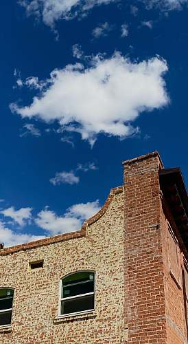 110 e congress st brown brick building under blue sky and white clouds during daytime tucson